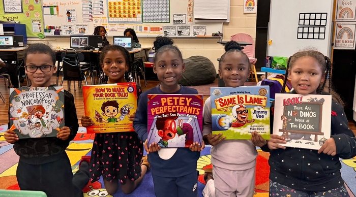 Children holding books